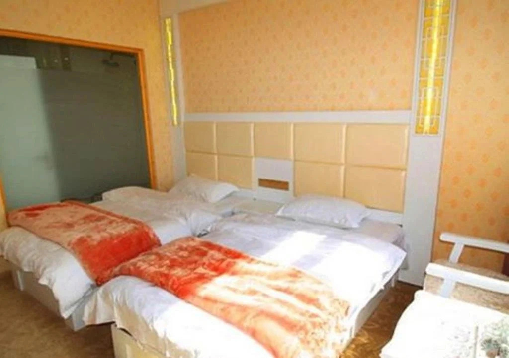 Mingge Busniess Hotel