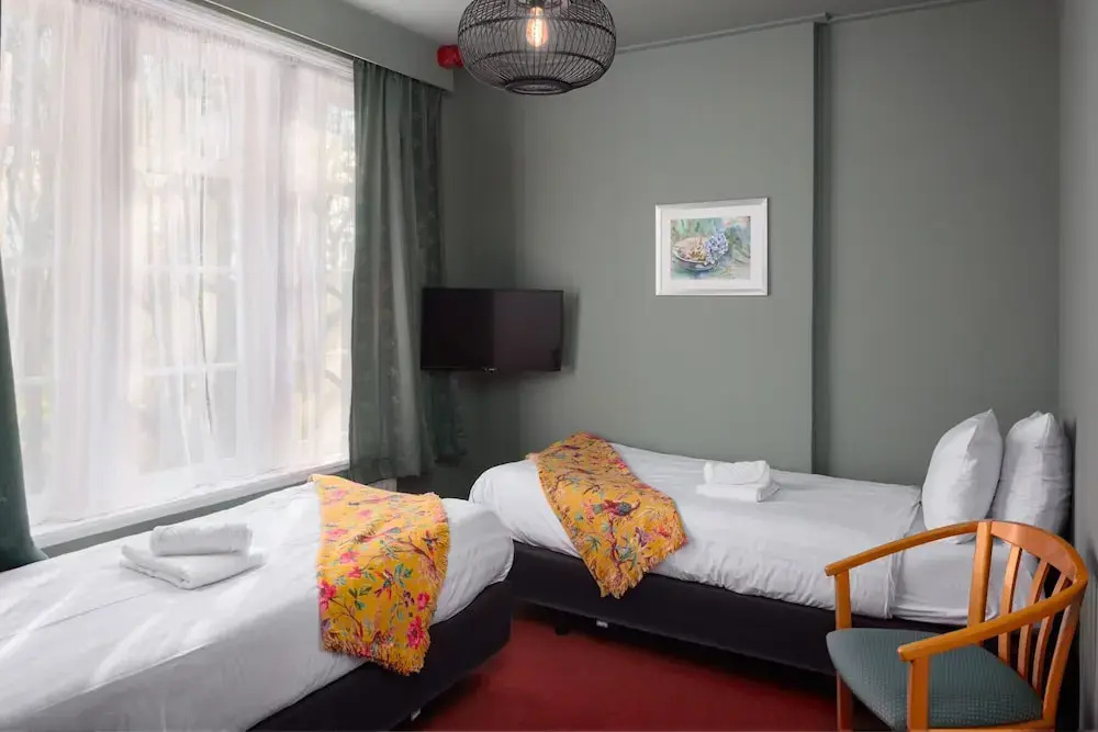 Green White Hotel - Chambres