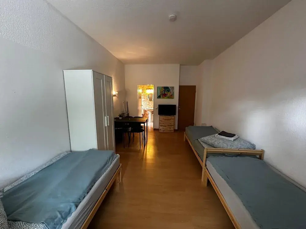 Standard Triple room with garden view