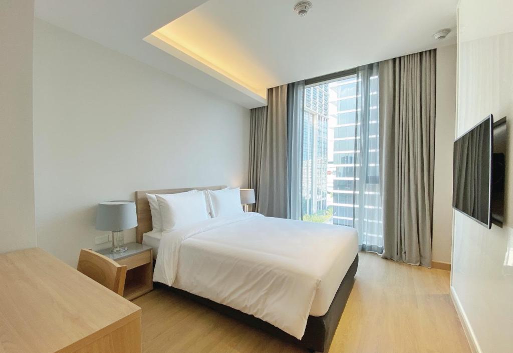 Апартаменты Deluxe с 2 комнатами в Oakwood Suites Bangkok