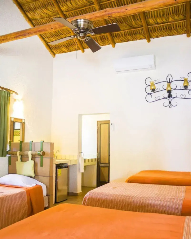 Hotel Palmas De Cortez - Chambres