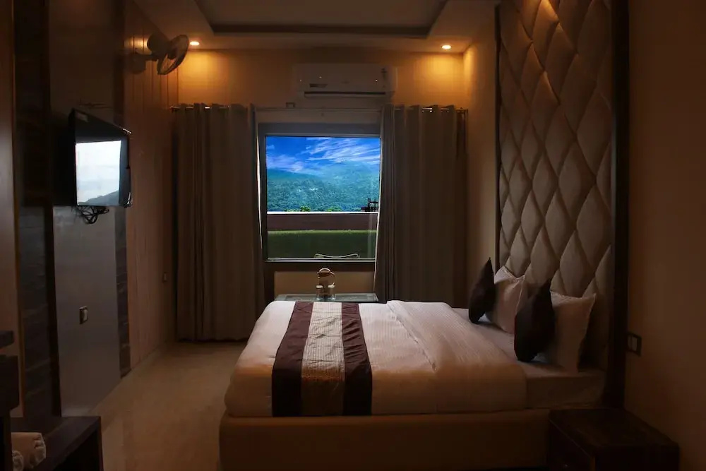 Hotel Ganga Heights By Avadhesh Group Of Hospitality - Chambres