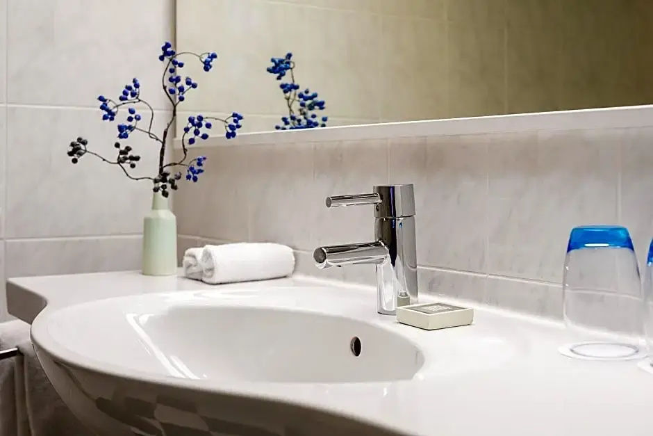 Golden Tulip Hotel Central - Chambres