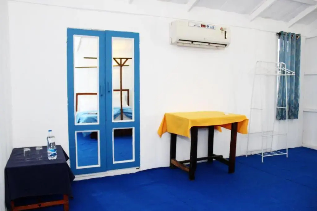 Cafe Blue Hotel - Chambres