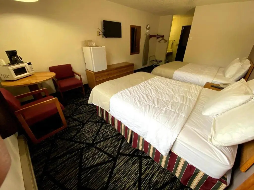 Woodlands Inn & Suites - Chambres