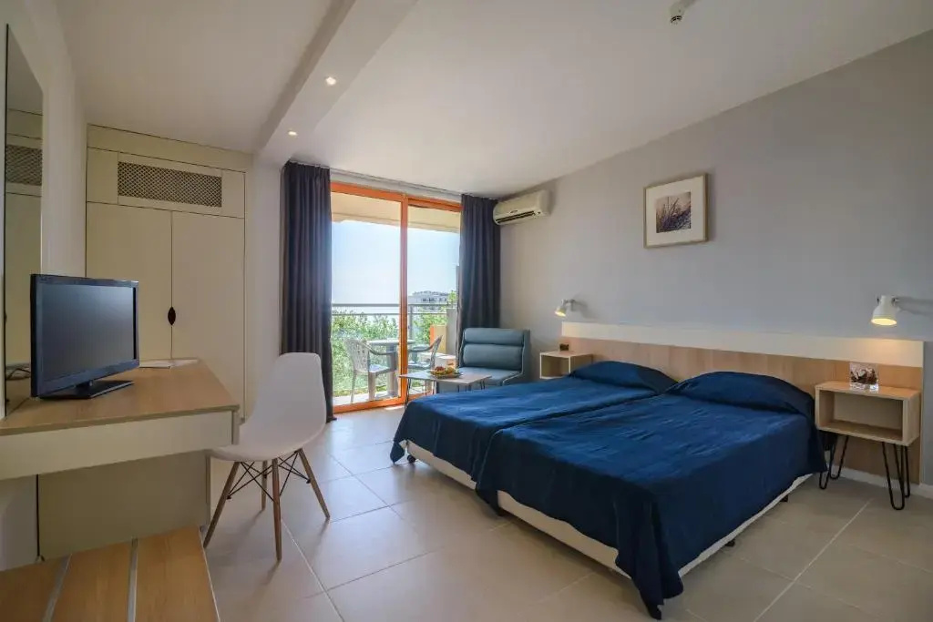 Sunrise Hotel - Chambres
