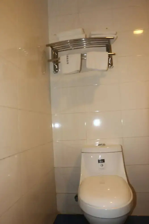 Yixin Business Hotel - Chambres