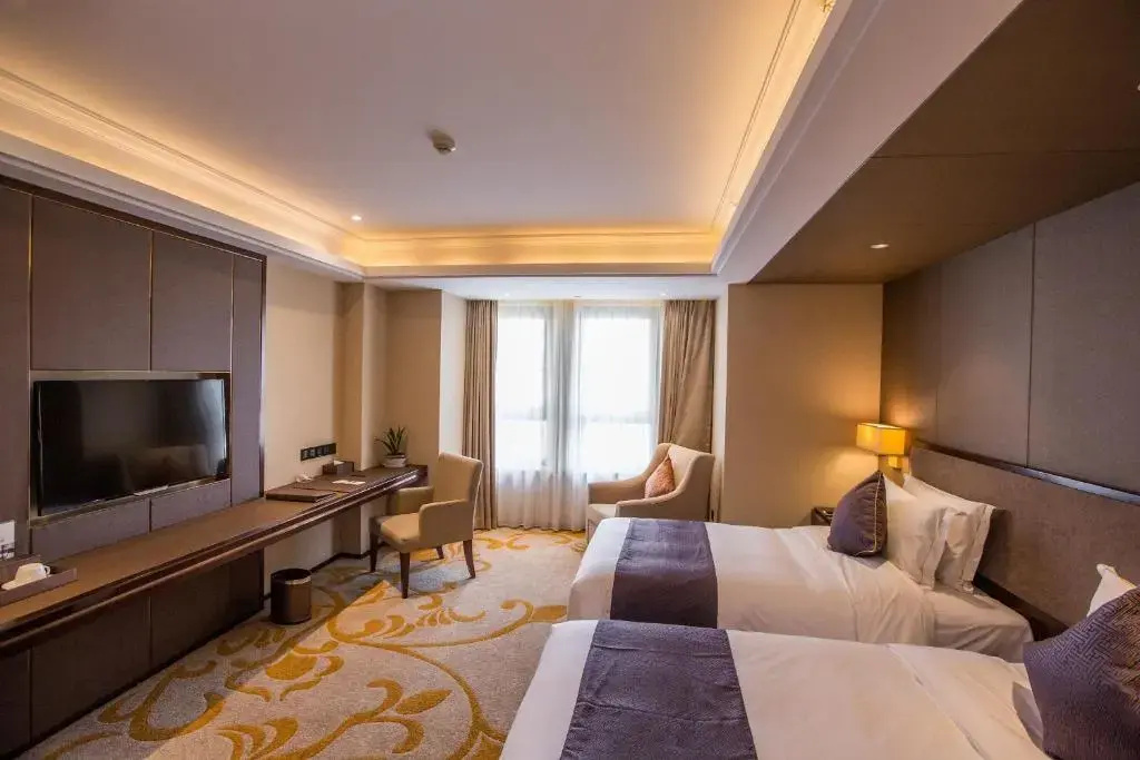 Sky World Hotel Qingdao - Chambres