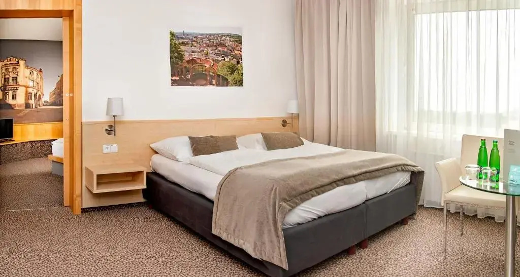 Cosmopolitan Bobycentrum - Chambres
