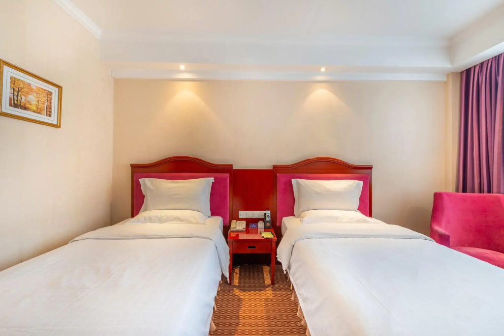 Lotus Huatian Hotel - Chambres