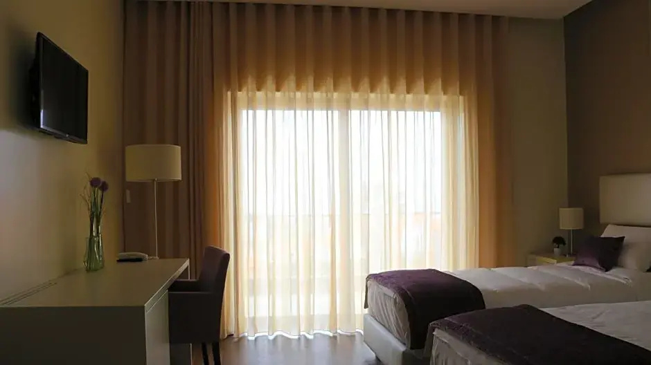 Monte Lírio Hotel - Chambres