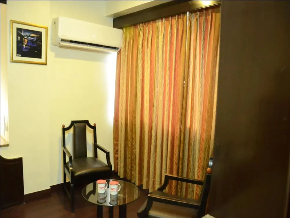 OYO 1216 Hotel New White House - Chambres