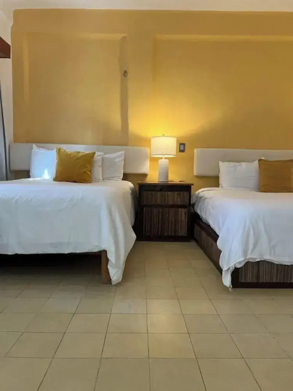 Deluxe Quadruple room with balcony