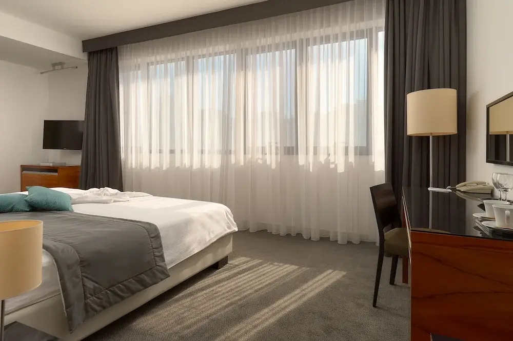 Atrium Hotel - Chambres