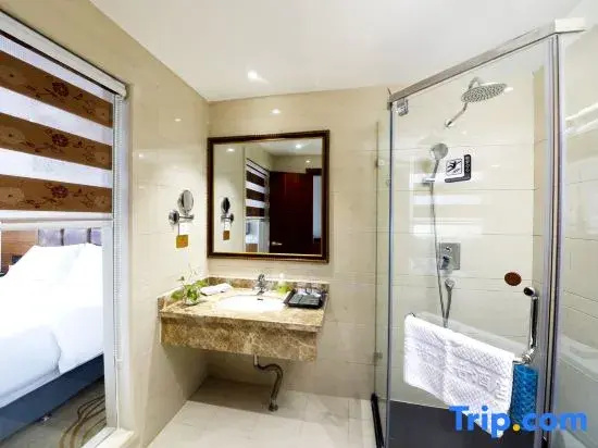 Harmonious Dunpu Hotel - Chambres