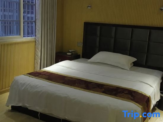 Huayun Hotel - Chambres