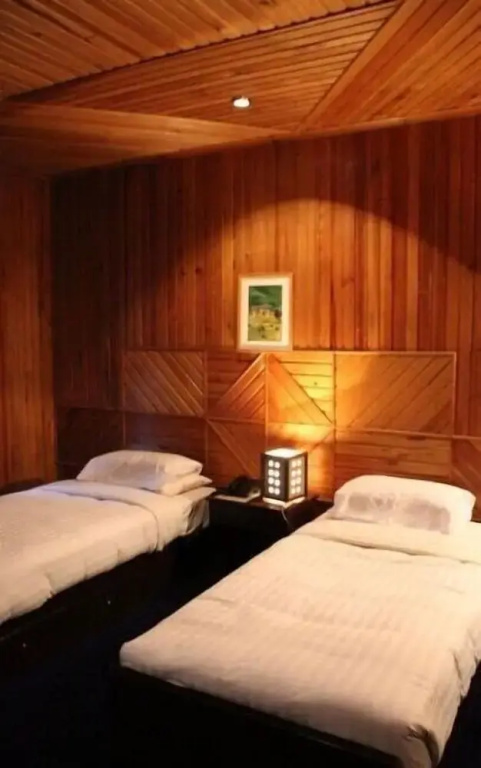 Olathang Hotel - Chambres