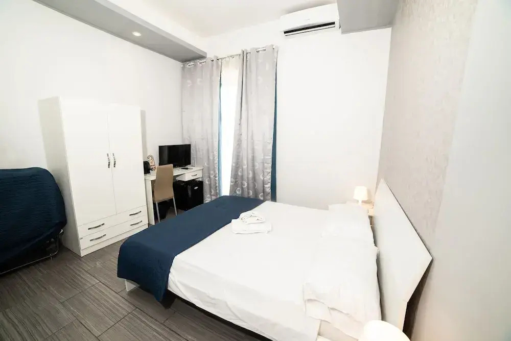 Standard Triple room with balcony and with city view