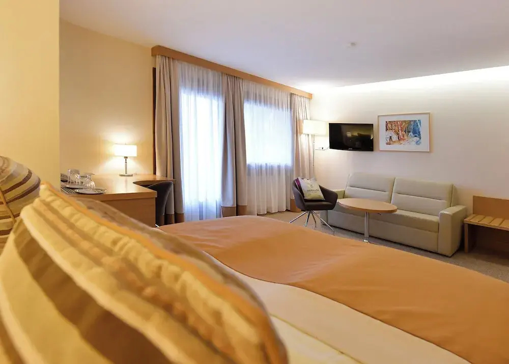 Comfort Quadruple room with balcony and with garden view