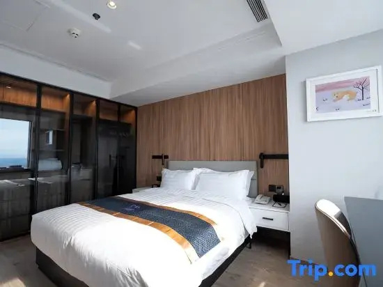 Jingguang Center Apartment Hotel - Chambres