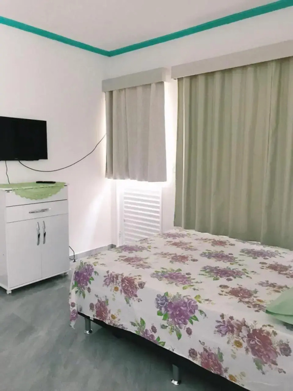 Suíte com cozinha no quintal da casa
