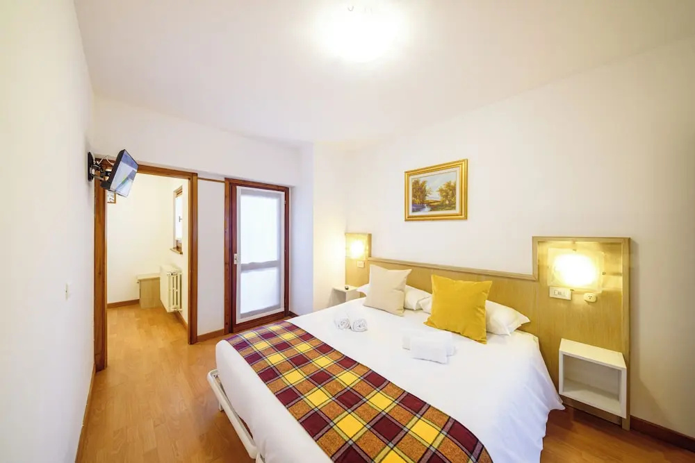 Classic Quadruple room with balcony