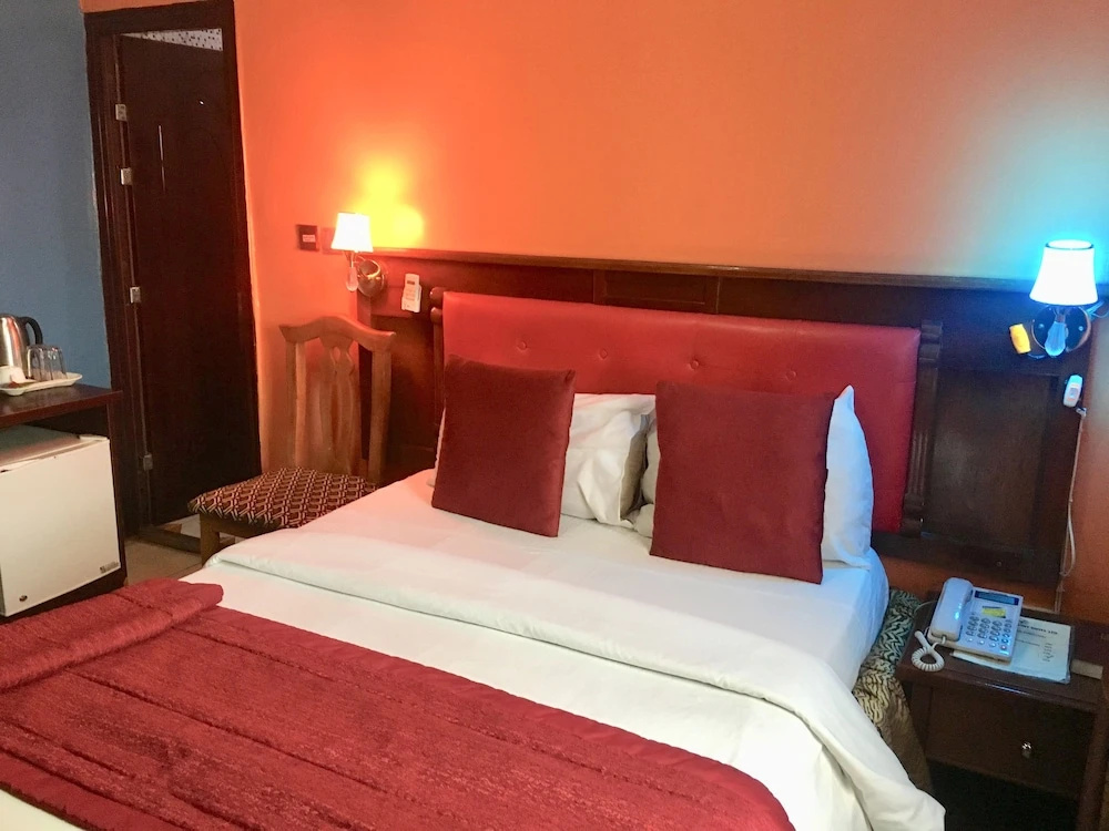 Definite Destiny Hotel - Chambres