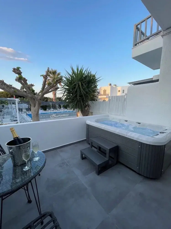 Luxury Double room with balcony and with pool view (full double bed)