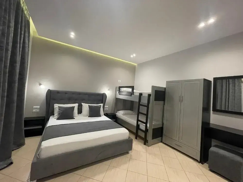 Deluxe Quadruple room with balcony and with lake view