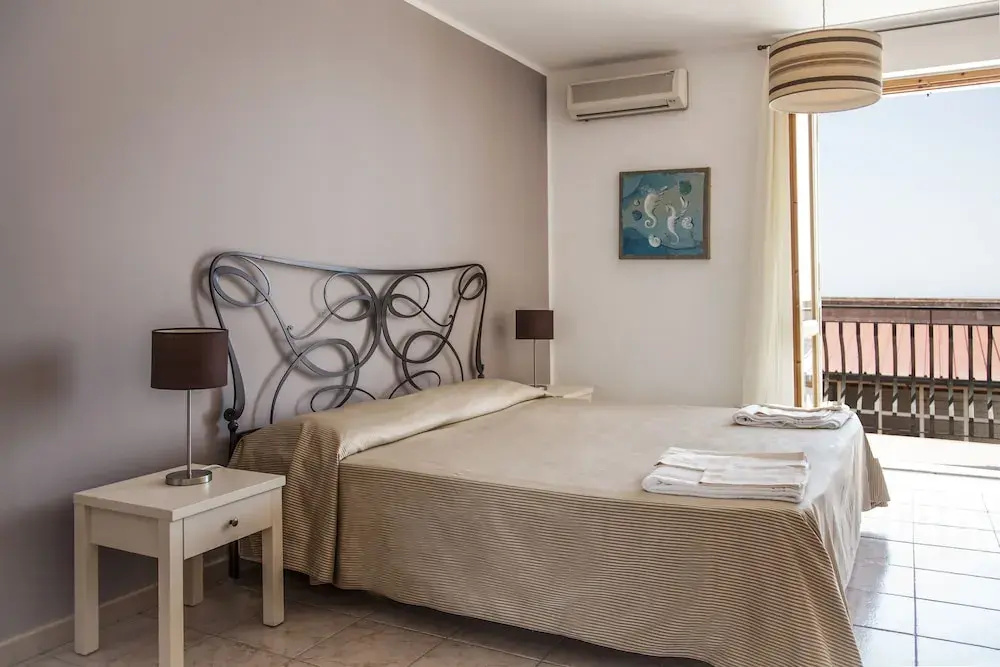 Superior room with balcony and with partial sea view