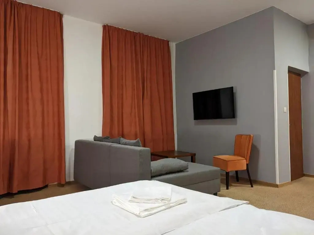 Garni Hotel Cosmopolitan - Chambres