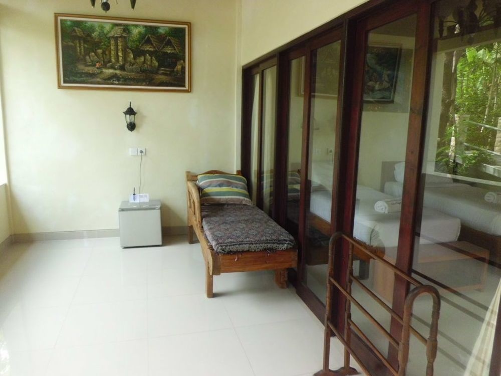 Отель Amed Cafe & Hotel Kebun Wayan в Пурвакерти