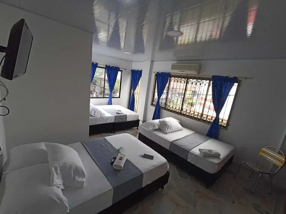Standard Quadruple room with balcony and with city view