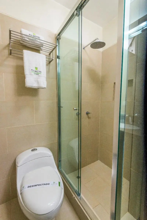 Palmetto Hotel Business La Perla - Chambres
