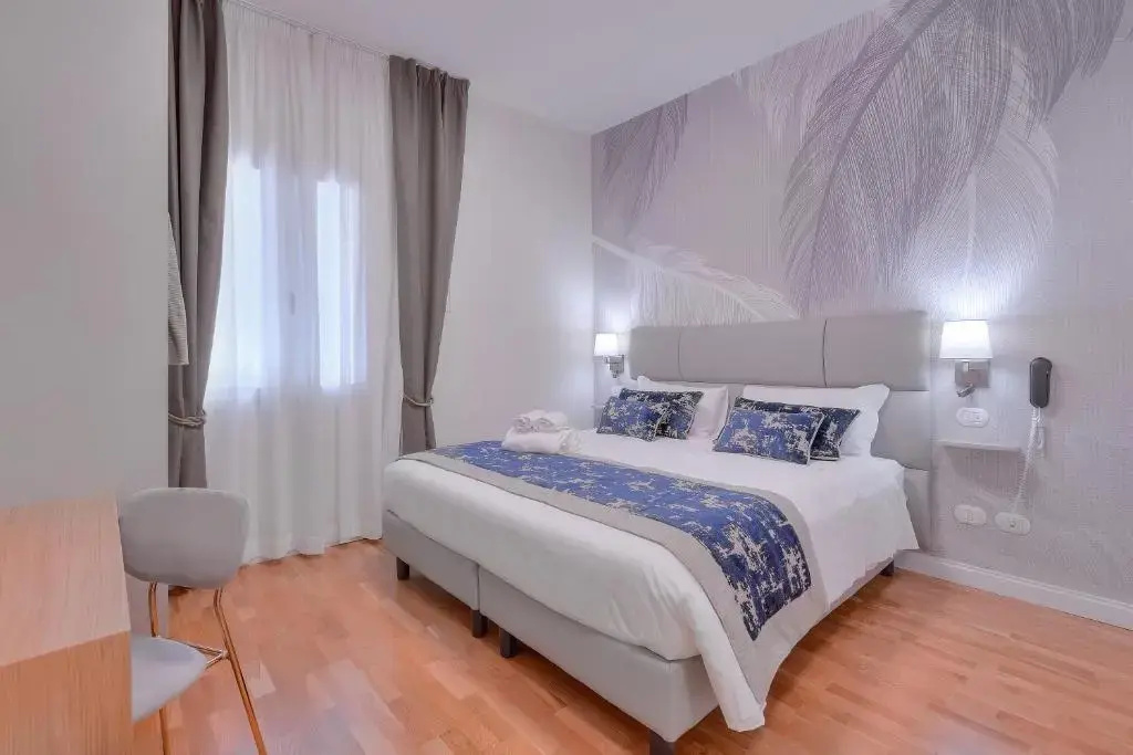 Hotel Cosmos - Chambres