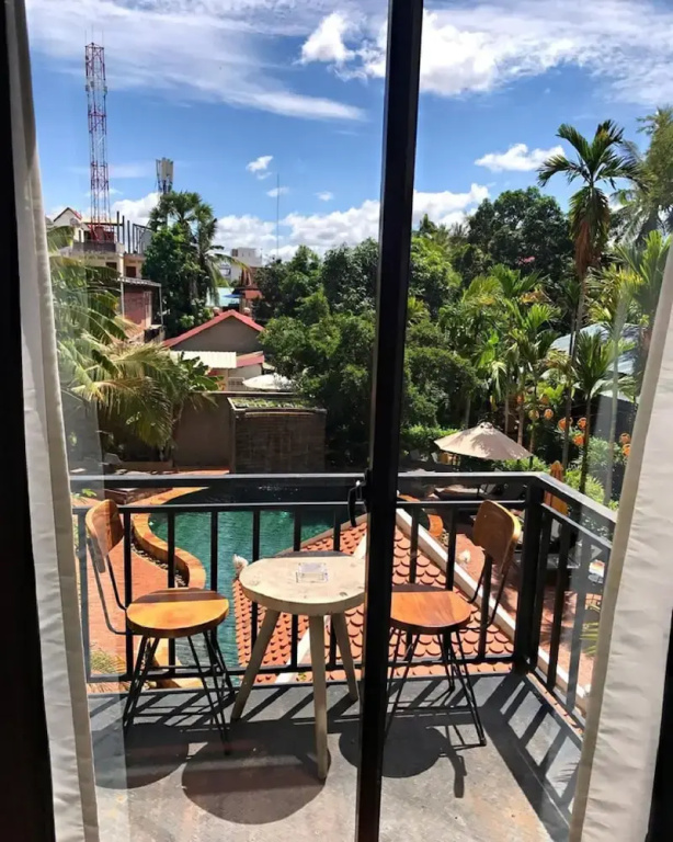 Privilege Double room with balcony and with pool view (full double bed)