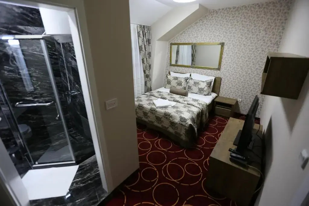 Hotel Pejton - Chambres