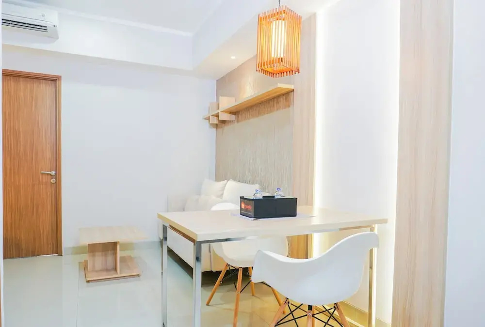 Clean and Elegant 1BR at The Oasis Apartment