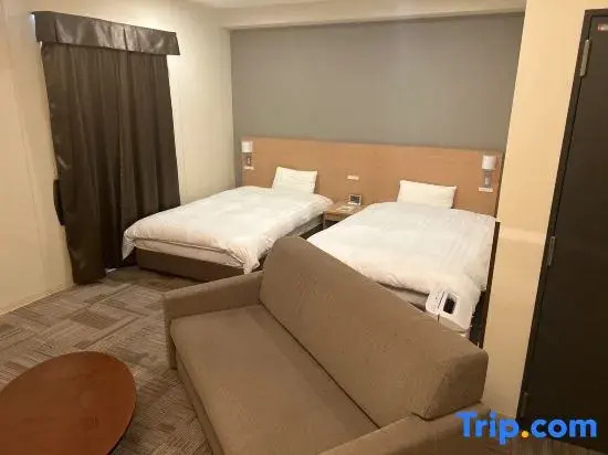 Deluxe Quadruple room twin beds