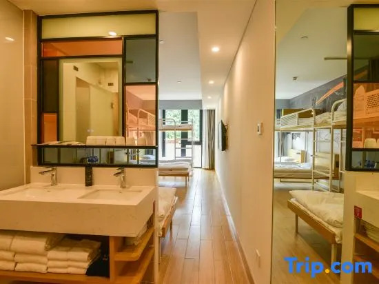 Кровать в общем номере в Zhangjiakou Yunding Miyuan Prince Hotel