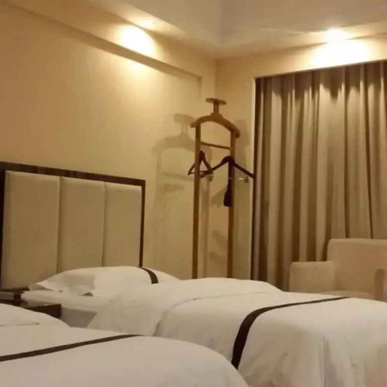 Junyue Hotel - Chambres