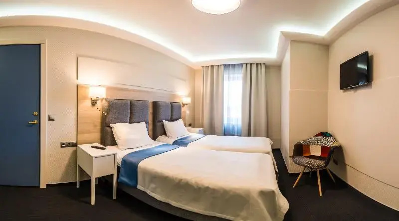 Amrita Hotel - Chambres