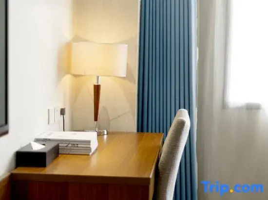 Harmonious Dunpu Hotel - Chambres