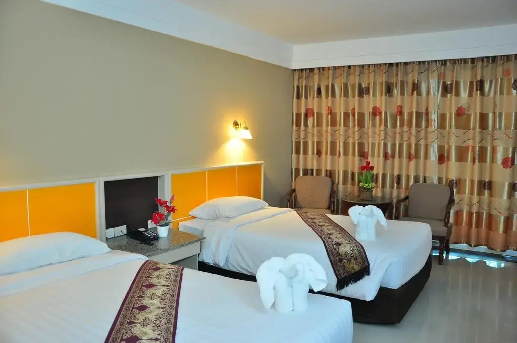 Ton Koon Hotel - Chambres