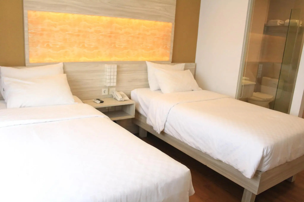Front One Akshaya Hotel Karawang - Chambres