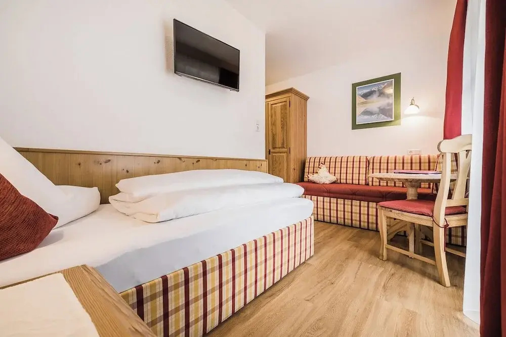 Andre Arnold - Boutique Pension - Chambres
