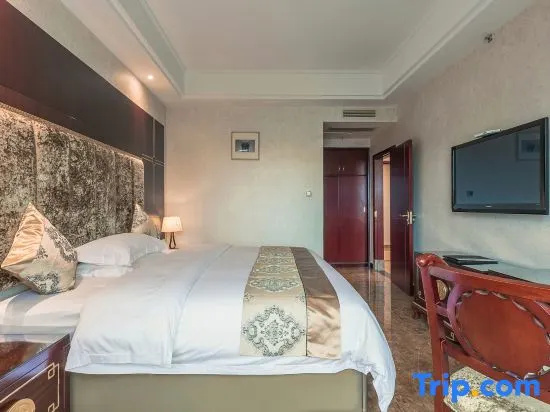 Yi Long Hotel - Chambres