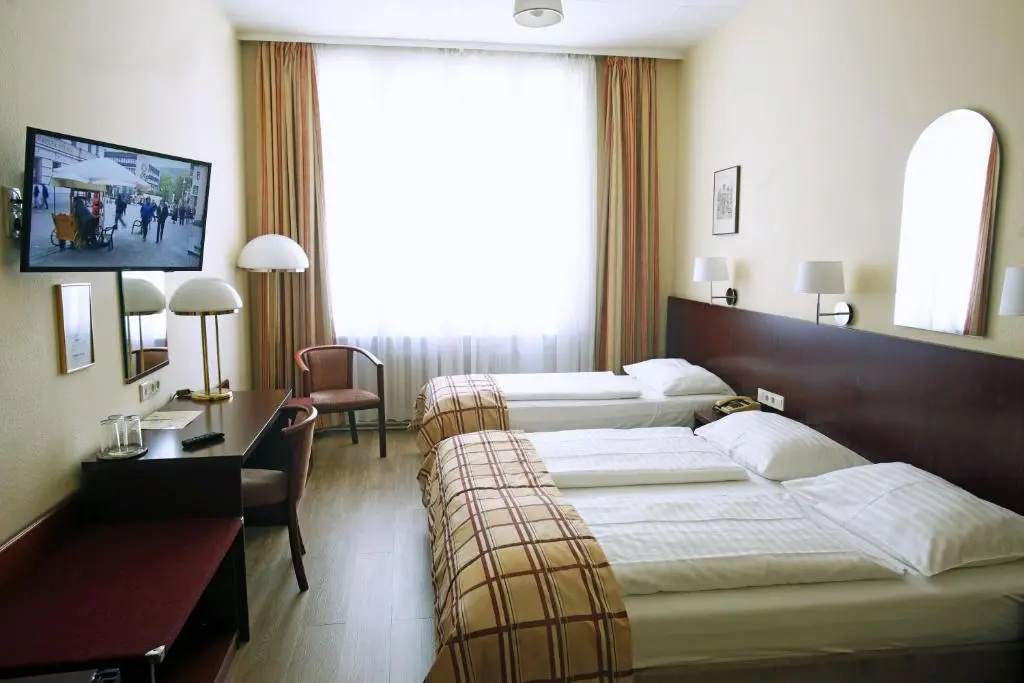 Continental Hotel-Pension - Chambres