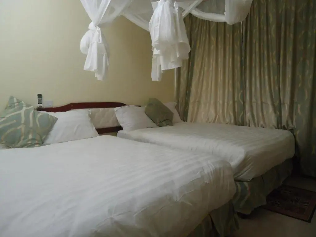 Mvuli Hotel - Chambres