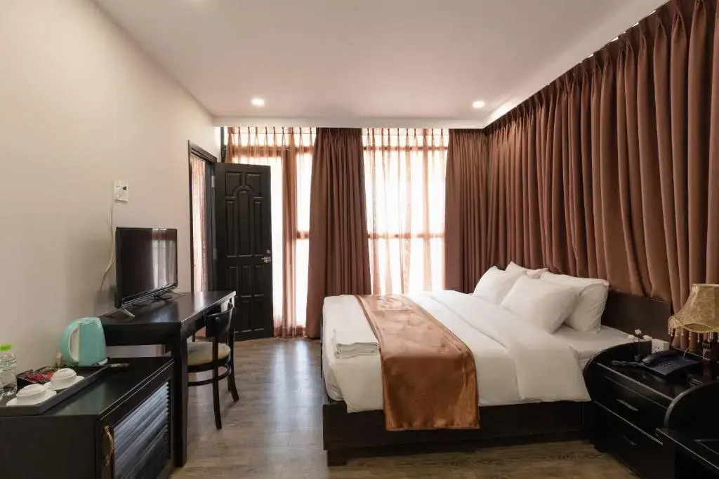 Queen Central Hotel - Chambres